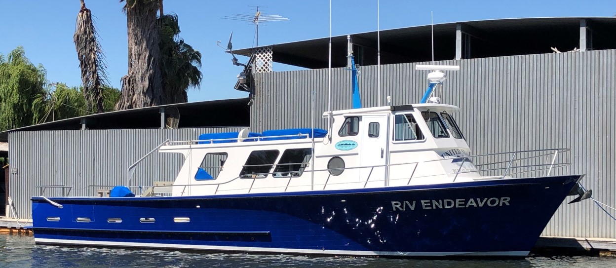 Image of California Department of Water Resources Research Vessel R/V Endeavor docked at a marina.